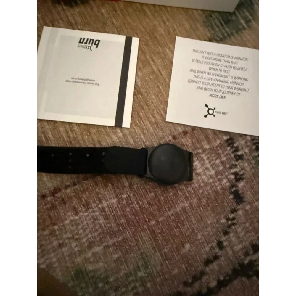 Orange theory heart monitor and box